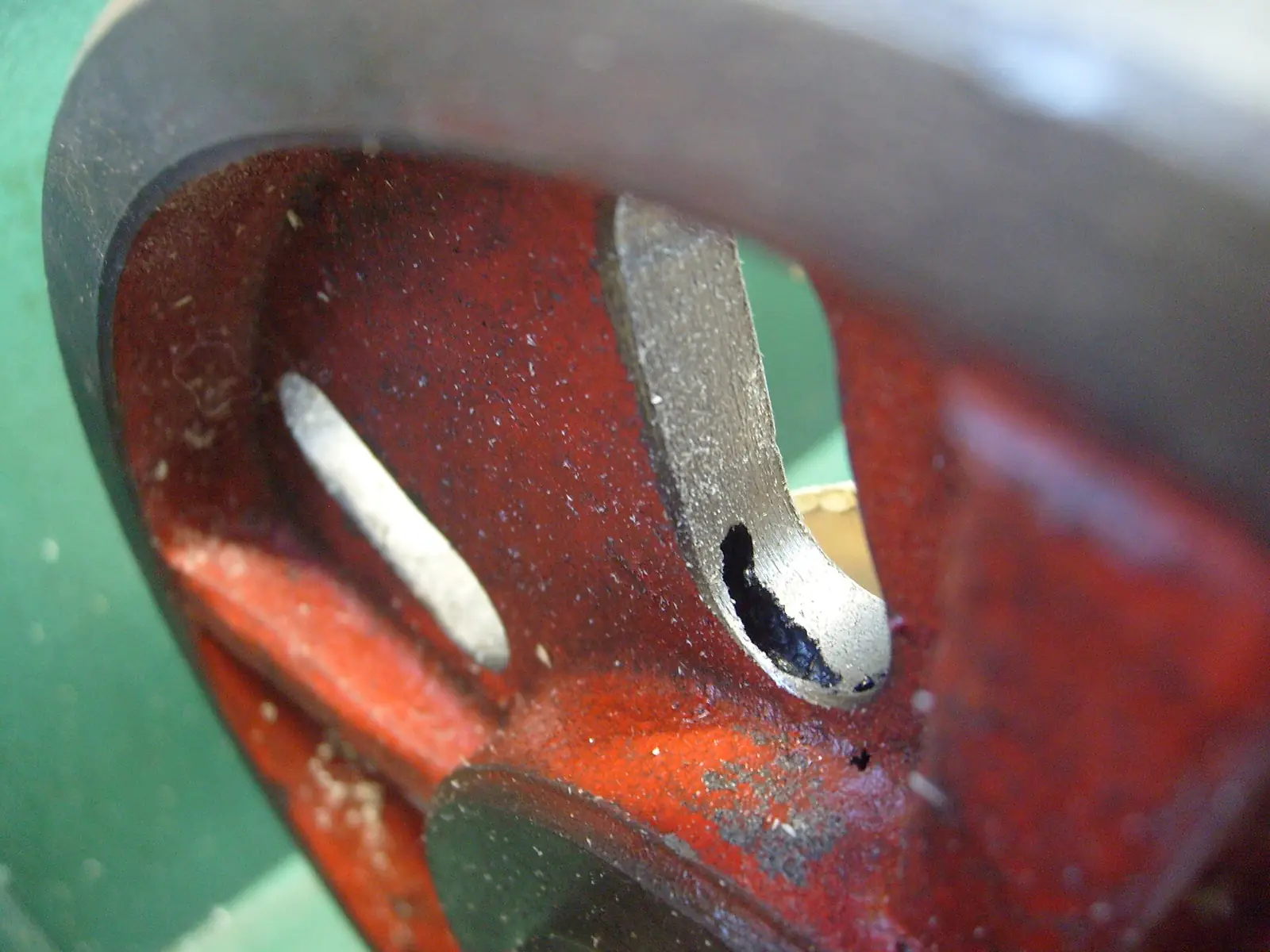 Close-up of a blowhole defect in a metal casting